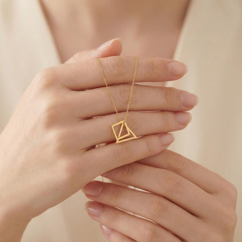 14K Gold Love Knot Triangle Necklace - 12-24 in M.0217