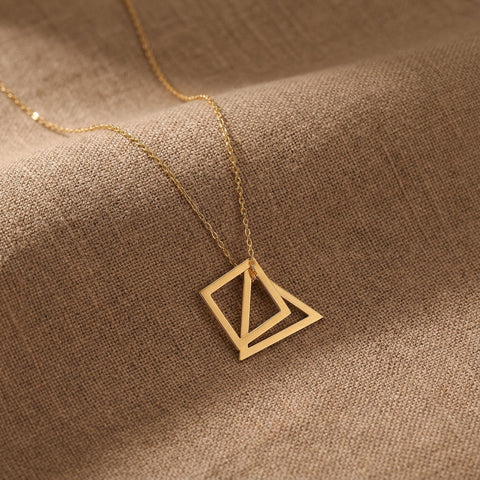 14K Gold Love Knot Triangle Necklace - 12-24 in M.0217
